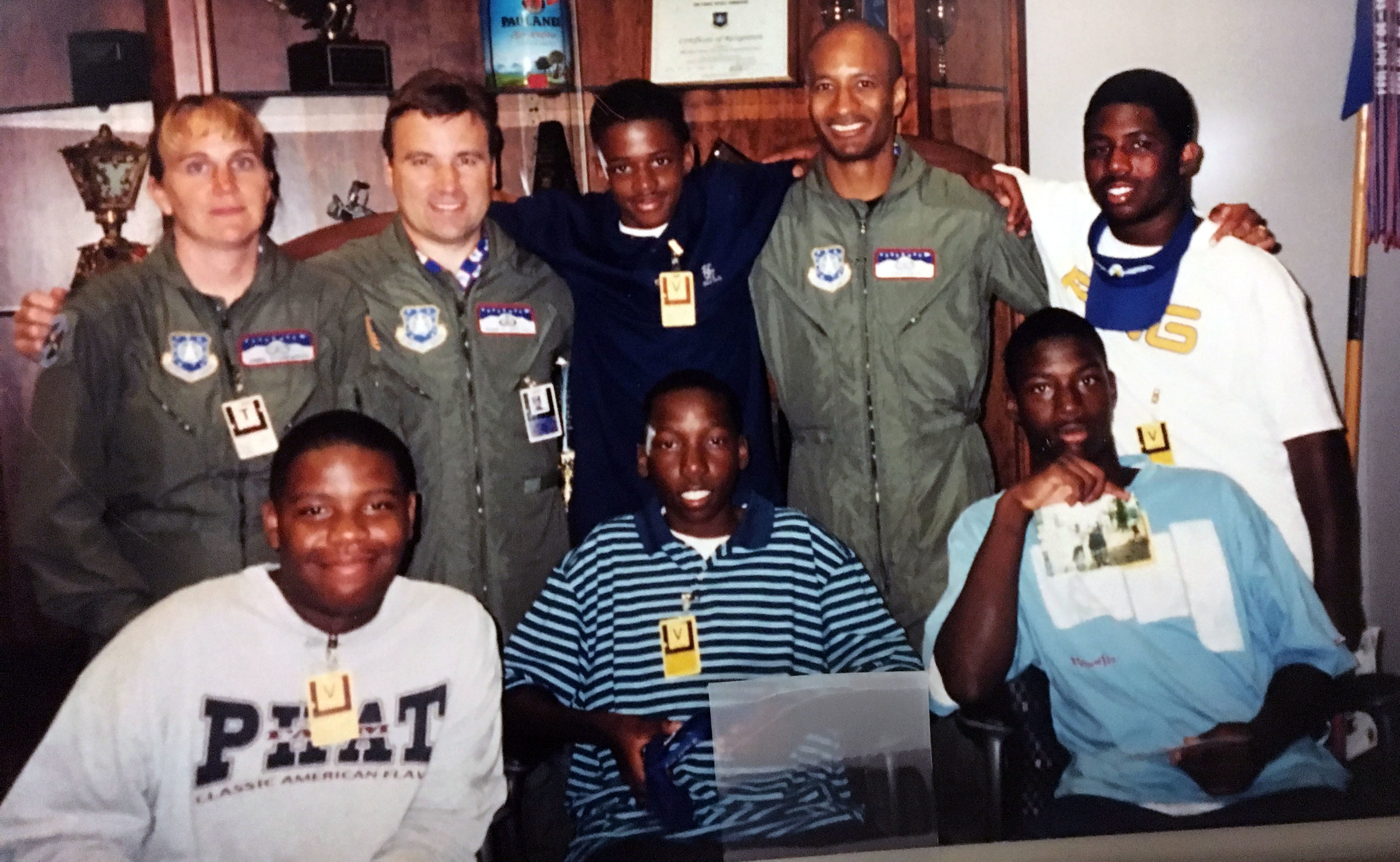 Chris Gray, second from the right in the top row, took a group of neighborhood teens to visit the Air Force Academy in Colorado many years ago.